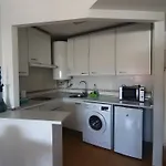 Calido Apartamento Con Piscina Y Garaje