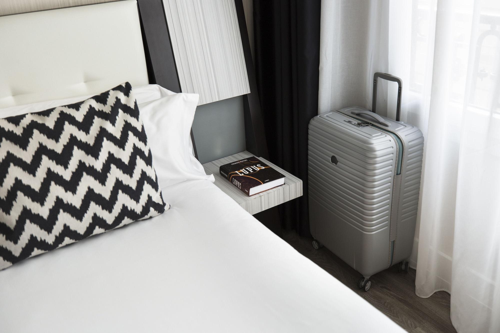 Petit Palace Triball Hotel